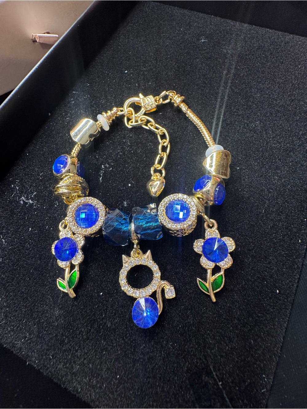 Gold-Tone Blue Crystal Charm Bracelet with Floral & Cat Pendants